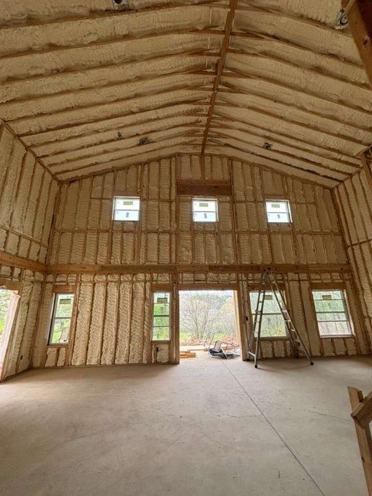 Interior before finishing — spray foam insulation stage