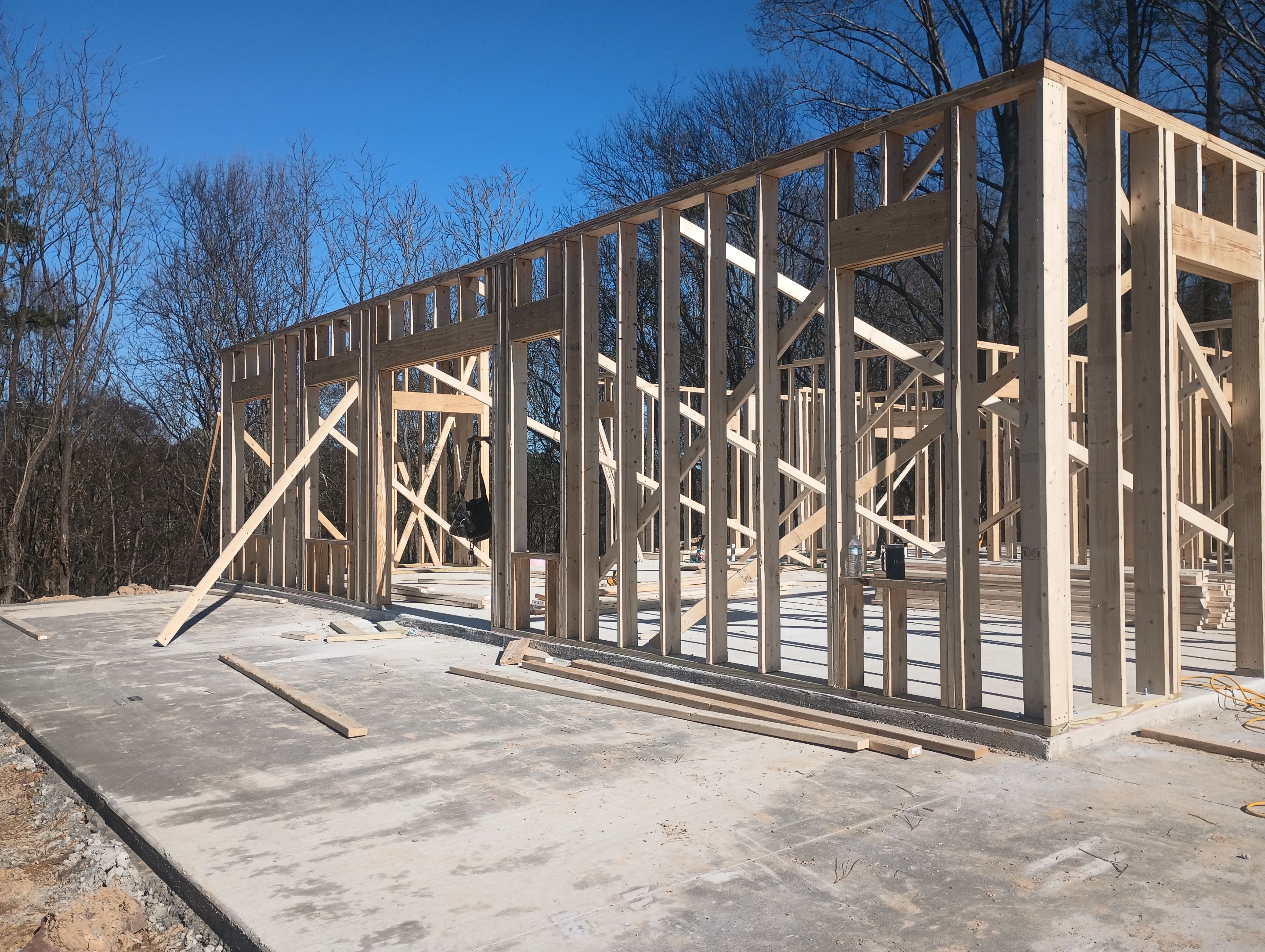 Framing stage — walls going up on new custom build